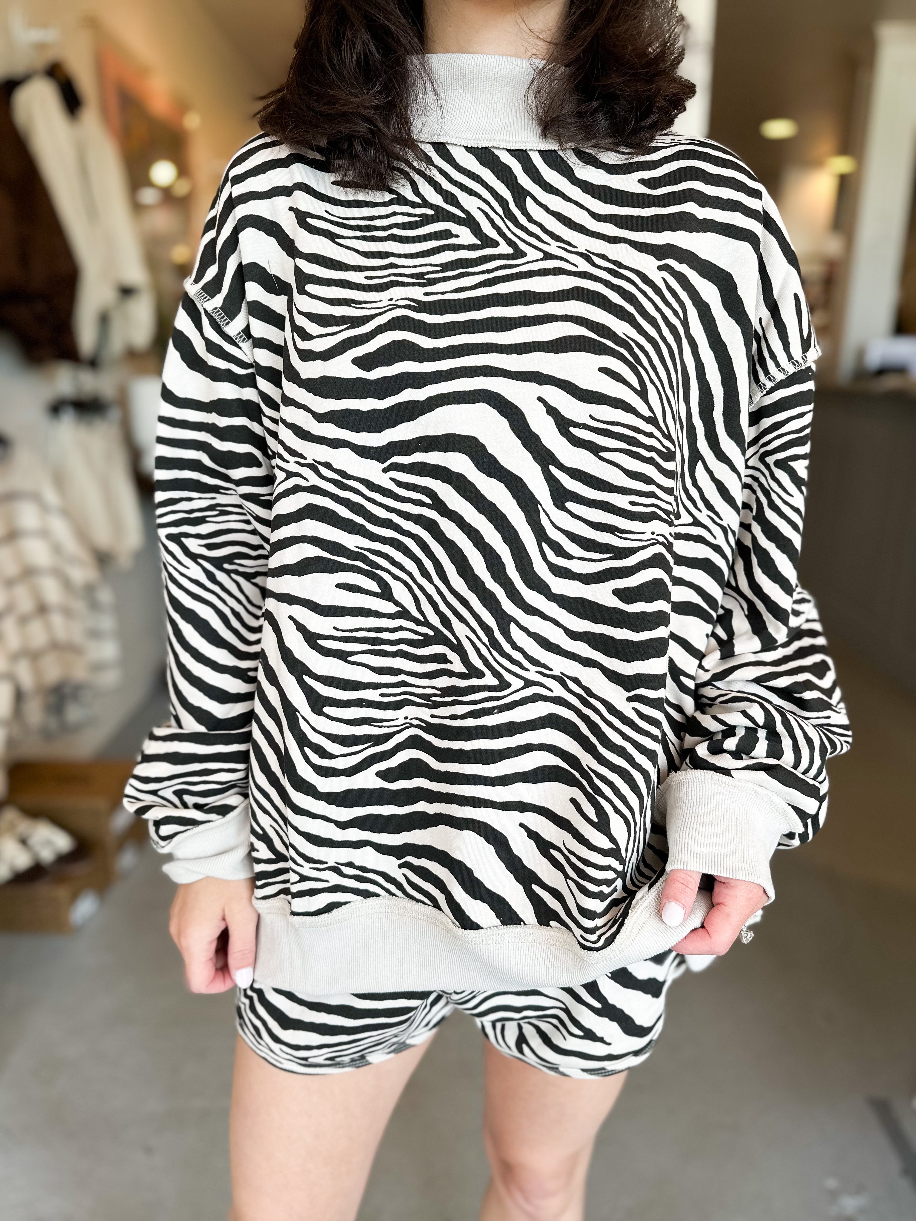 Bucket List Zebra Print Mockneck